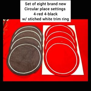 5/$25 set of eight brand new Circle place settings 4-red 4-black w/ stiched trim